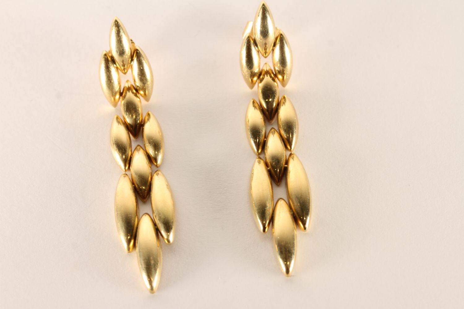 A Pair of 18ct link design earrings, smooth tear drop links, Cartier 1989, B30504 marks, 13.8g