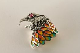 Eagle Head Brooch, set with a ruby eye, inlaid with enamel, set with marcasite, stamped sterling