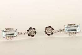 Pair of Aquamarine and Diamond Earrings, each set with a baguette cut aquamarine, 4 claw set,