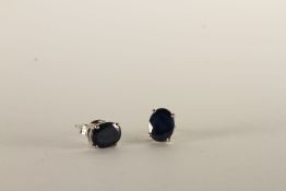 Pair of Sapphire Stud Earrings, set with 2 oval cut sapphires, 4 claw set, stamped sterling silver