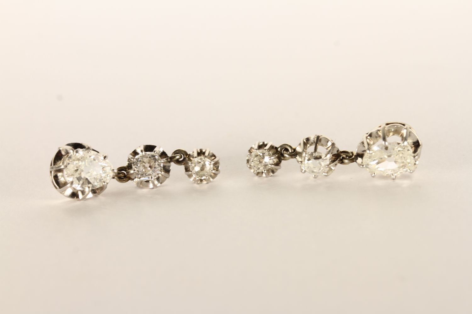 2.10ct Pear of Old Cut Diamond Drop Earrings, feature old cut pear drops, estimated (7.87x6.08x2.