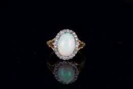 Victorian Opal and Diamond Cluster ring, Large Opal cabochon, 12.2x9mm estimated 2.5cts, with a