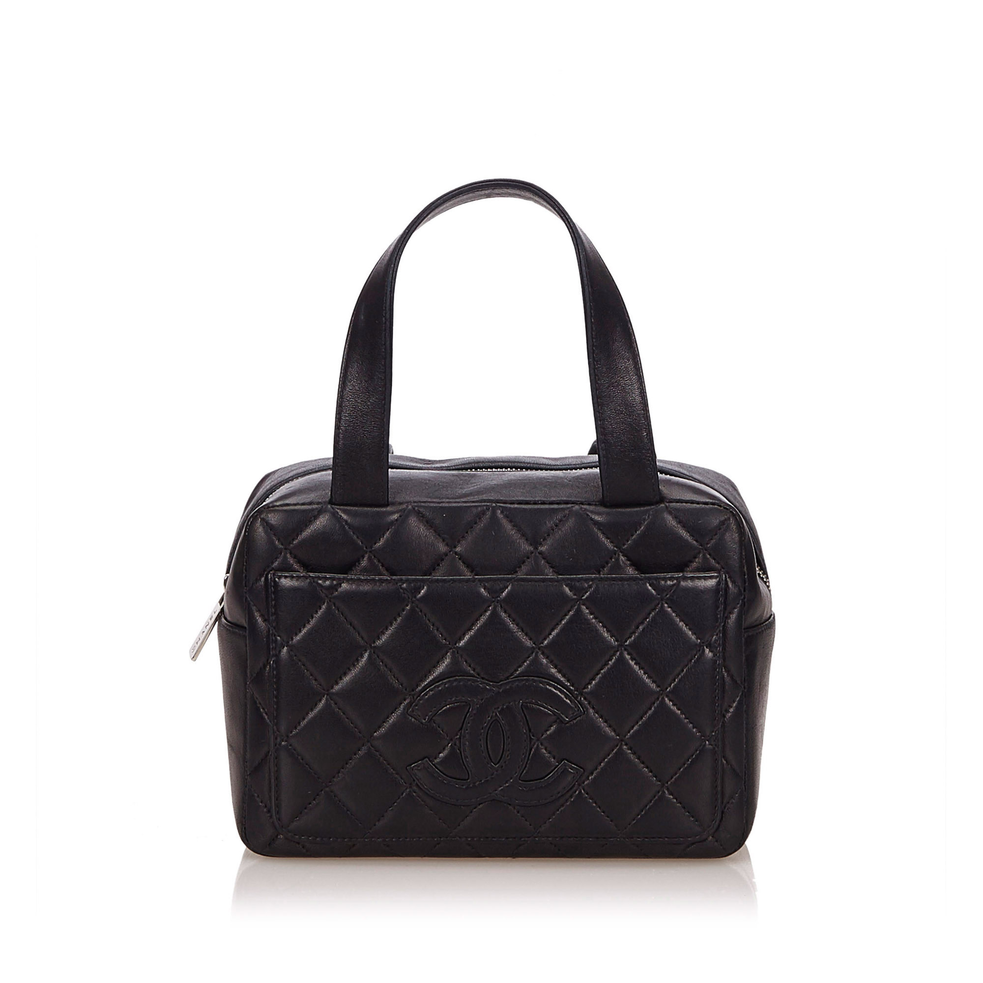 Chanel Matelasse Lambskin Leather Handbag, this handbag features a leather body, exterior front slip