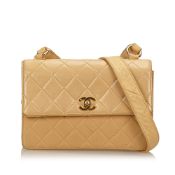 Chanel Quilted Lambskin Shoulder Bag, this shoulder bag features a quilted lambskin leather body,