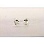 Pair of Diamond Stud Earrings, set with a total of 2 round brilliant cut diamonds totalling 0.