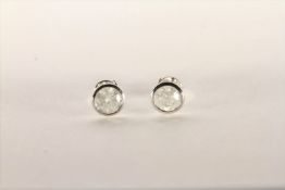 Pair of Diamond Stud Earrings, set with a total of 2 round brilliant cut diamonds totalling 0.