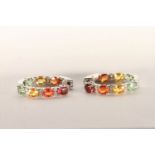 Pair of Multi-Coloured Sapphire and Diamond Hoop Earrings, set with a total of 14 oval cut yellow,