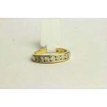 18CT SEVEN STONE HALF ETERNITY RING, TOTAL DIAMOND WEIGHT 0.50CT,stamped inside shank 0.50ct,