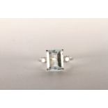 Aquamarine and Diamond Ring, set with an emerald cut aquamarine totalling 3.71ct, 4 claw set,