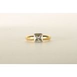 Diamond Solitaire Ring, set with a princess cut diamond approximately 1.11ct, rubover set, 18ct