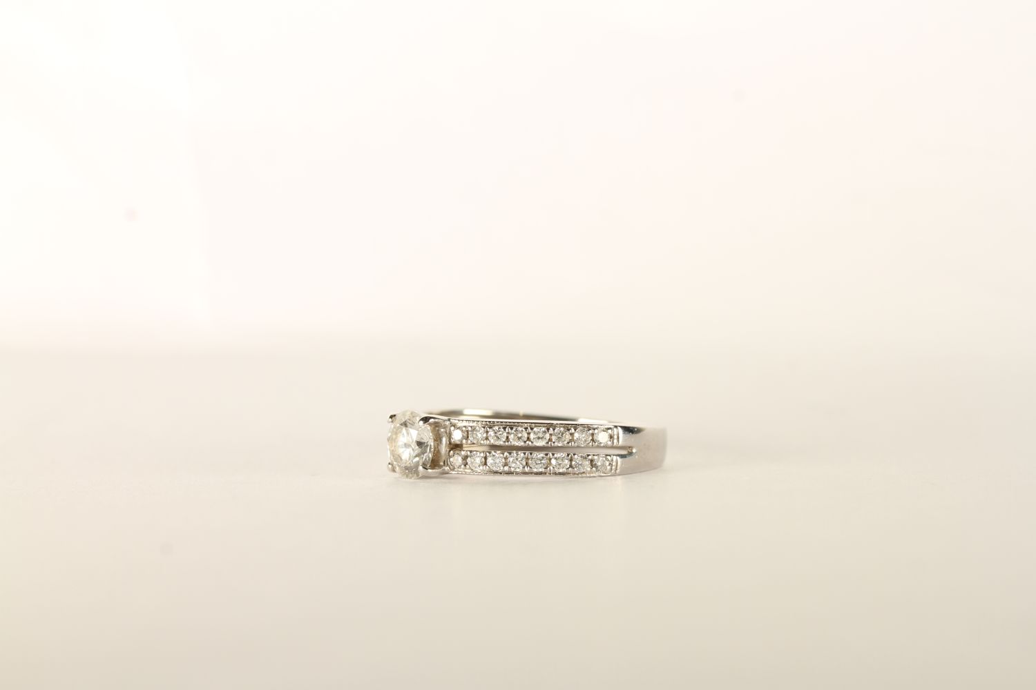 Diamond Ring, centre set with a round brilliant cut diamond, 4 claw set, shoulders set with 2 rows - Image 2 of 2