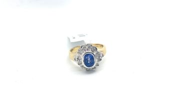 Sapphire and Diamond Cluster Ring, oval cut sapphire collet set, surrounded with brilliant cut