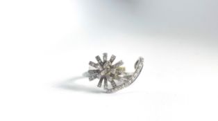 18ct diamond set dress ring, bow cluster with floating crescent design, in white gold stamped and
