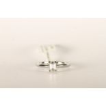 Emerald Cut Diamond Solitaire Ring, set with a sin