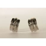 Pair of Diamond Huggie Earrings, each set with 3 rows of baguette cut diamonds, stamped 14ct white