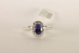Tanzanite and Diamond Halo Cluster Ring, set with