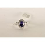 Tanzanite and Diamond Halo Cluster Ring, set with