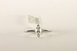 Marquise Cut Diamond Solitaire Ring, set with a si