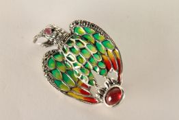 Silver eagle brooch set with a cabochon ruby, ruby eye, coloured enamel and marcasites