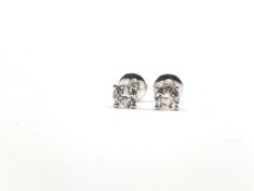 Pair of 18ct white gold 4 claw-set RBC diamond solitaire studs, boxed. Diamonds 1.01ct