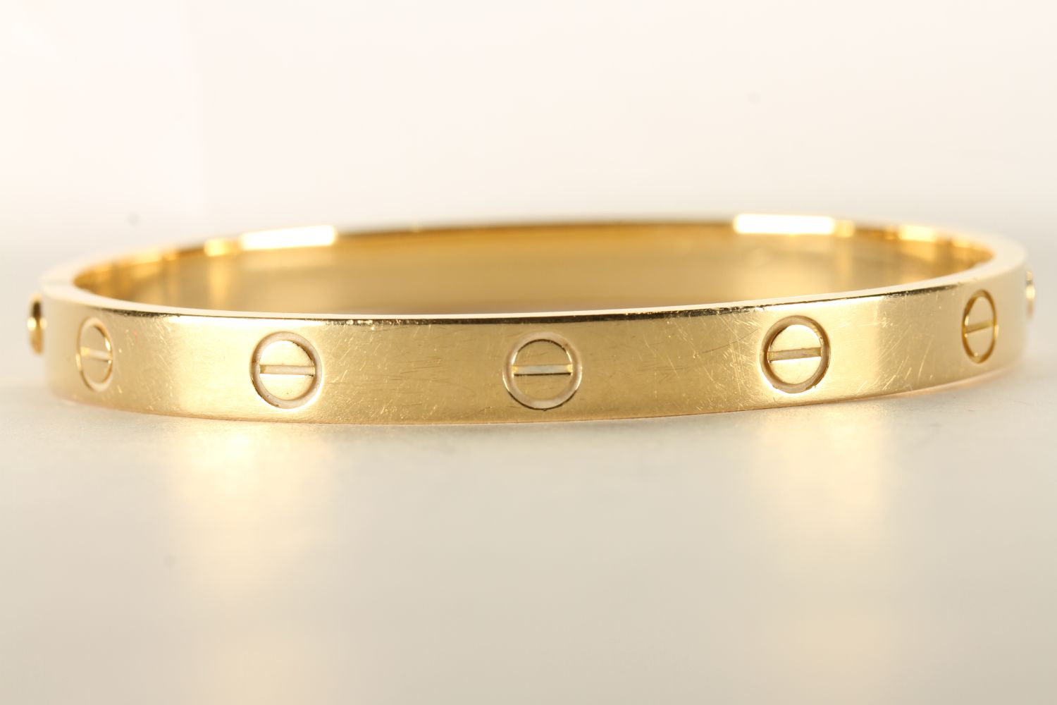Cartier Love Bangle, stamped 18ct yellow gold, will fit a wristsize of up to approximately 16cm,