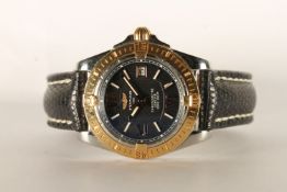 LADIES BREITLING WRISTWATCH REF C71356, circular black dial with roman numerals and hour markers,