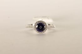 Tanzanite and Diamond Cluster Ring, set with a sin