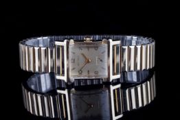 GENTLEMENS WITTNAUER WRISTWATCH, rectangular gold dial with gold hour markers and hands,