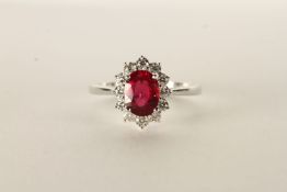 18ct white gold oval-cut ruby and RBC diamond cluster ring. Ruby 1.66ct. Diamonds 0.48ct