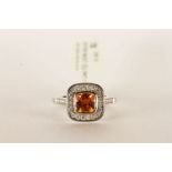 Mandarin Garnet and Diamond Cluster Ring, set with