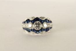 Fancy, platinum dress ring set with sapphires and diamonds