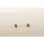Pair of Diamond Stud Earrings, each set with a single round brilliant cut diamonds, 4 claw set,