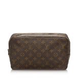 Louis Vuitton Monogram Trousse Toilette 28 Bag, the Trousse Toilette 28 features a monogram canvas