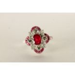 Edwardian-style platinum ruby and diamond dress ring. Central ruby 1.65ct, approx. Diamonds, 1.20