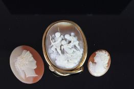 Group of 3 Cameos, 1 cameo set brooch with 3 cherubs, width 55mm, length 69mm, 1 loose cameo,