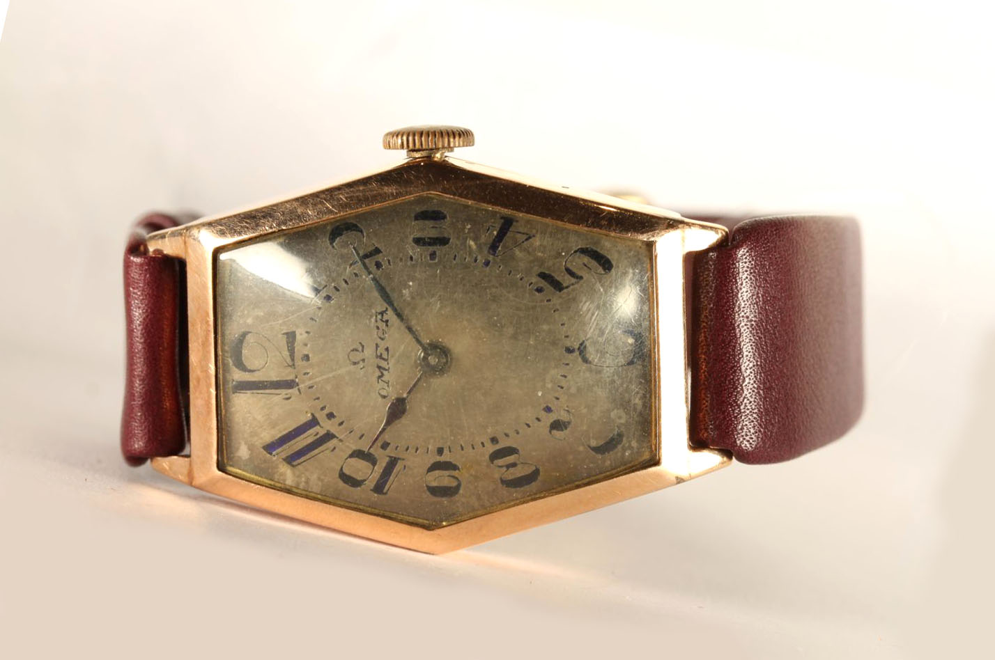 GENTLEMENS OMEGA OVERSIZE CIRCA 1920/30's WRISTWATCH, hexagonal aged dial with arabic numbers and an