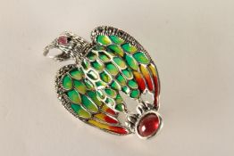 Silver eagle brooch set with a cabochon ruby, ruby eye, coloured enamel and marcasites