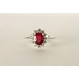 18ct white gold oval-cut ruby and RBC diamond cluster ring. Ruby 1.66ct. Diamonds 0.48ct