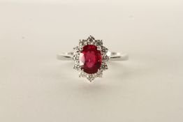 18ct white gold oval-cut ruby and RBC diamond cluster ring. Ruby 1.66ct. Diamonds 0.48ct