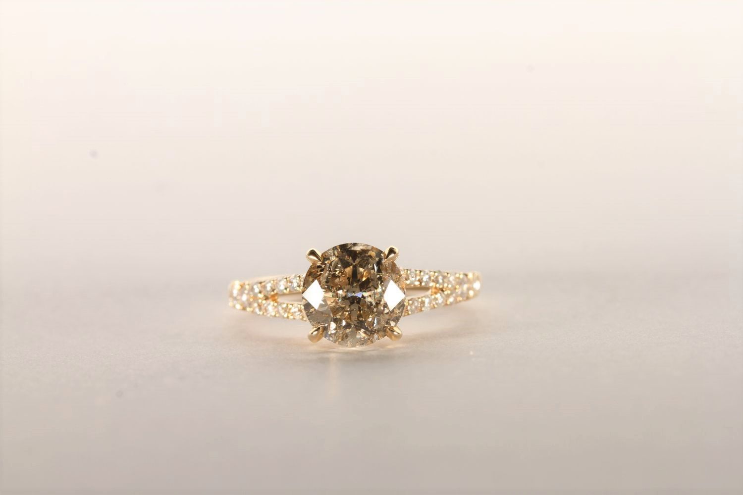 Champagne Diamond Ring, set with a round brilliant cut champagne diamond totalling 2.12ct, 4 claw