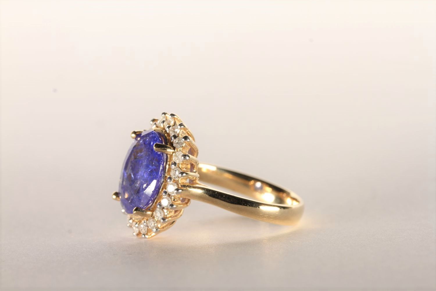 Tanzanite and Diamond Ring, set with an oval cut light violet blue tanzanite totalling 3.07ct, 4 - Image 2 of 4