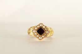 VICTORIAN 18CT GARNET AND SEED PEARL MEMORIAL CLUSTER RING, 'in memory of' band, hallmarked,total