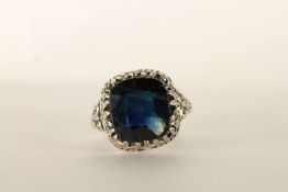 Sapphire dress ring, large cushion cut dark blue sapphire, 12.5x11.3mm, mounted in a pierced work