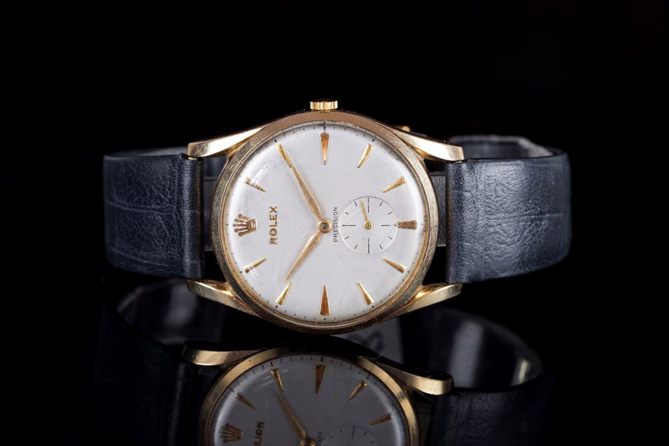 GENTLEMENS ROLEX PRECISION 9CT GOLD WRISTWATCH, circular silver dial with gold arrow head hour
