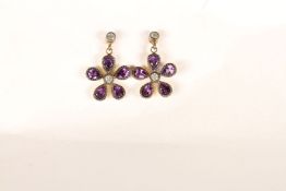 Pair of Daisy-style Earrings, set with amethyst and diamonds, butterfly backs, comes with a box.