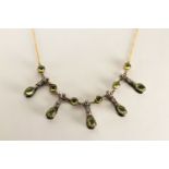 Art Nouveau-style Necklace, set with polished peridot and diamonds, stamped 9ct yellow gold,