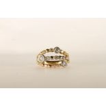 Diamond Ring, set with round brilliant cut diamonds in 3 open rows, rubover set, stamped 18ct yellow