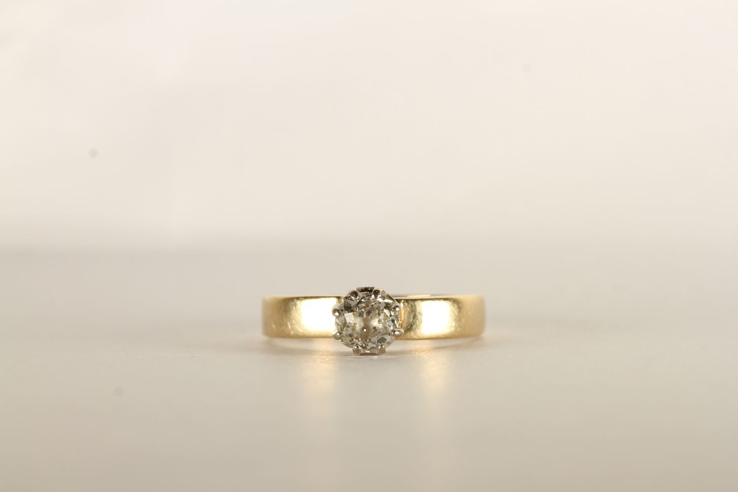 Diamond Solitaire Ring, set with a single round brilliant cut diamond, 8 claw set, 14ct yellow gold,