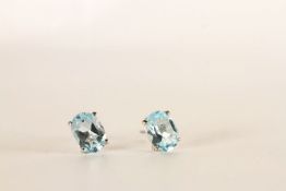 Pair of Blue Topaz Stud Earrings, 4 claw set, stamped sterling silver, butterfly backs.