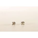 Pair of Diamond Solitaire Earrings, total approximate Diamond weight 1.45 ct, 4 claw set, stamped
